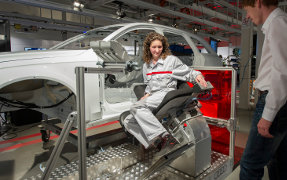 A new generation of the ergonomic assembly seat is setting a precedent in Ingolstadt. The seat enables employees to move into the interior of the car even more effortlessly and then carry out assembly work in a relaxed posture. It is demonstrated here on the exhibition stand.
Photo: Audi AG